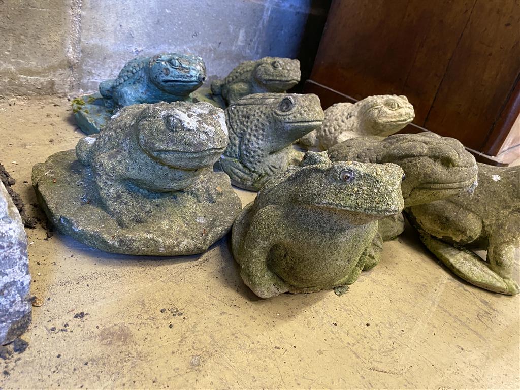 Eight reconstituted stone garden ornaments of frogs and toads, three as fountain heads, largest 18cm high